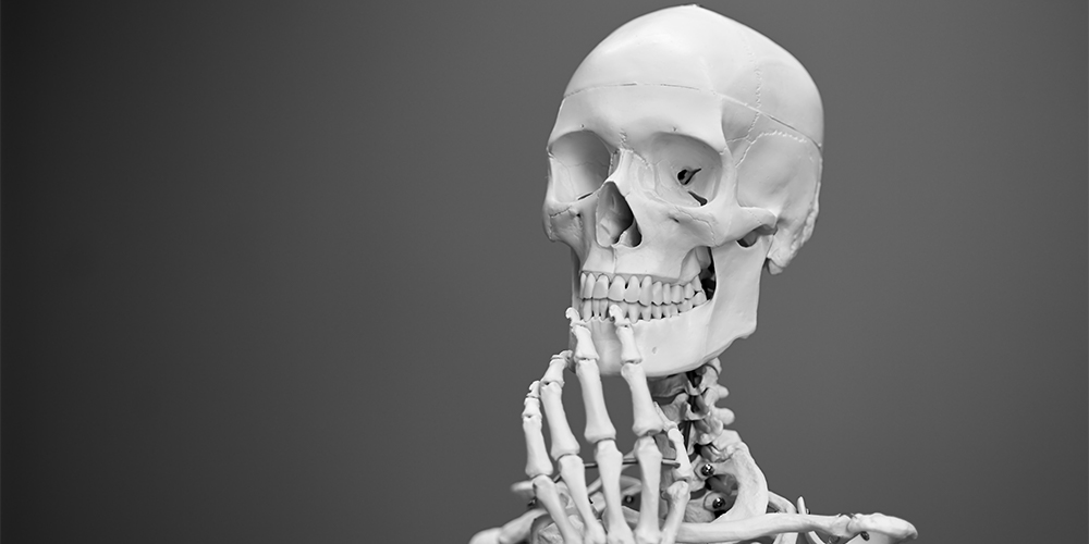 Skeleton posing in a thoughtful manner