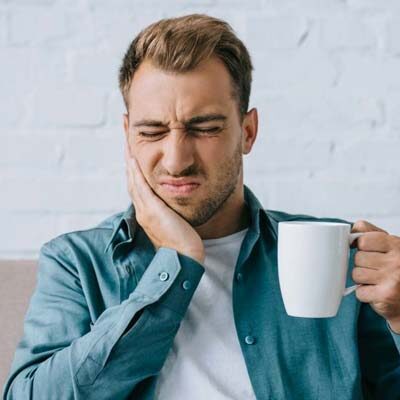 man in pain with a toothache